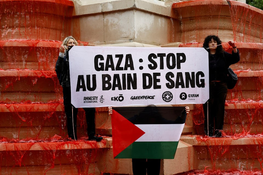 People participate in a demonstration organised by Human Rights activists from Amnesty International, Greenpeace, Oxfam and Medecins du Monde, to show support for Palestinians in the Gaza Strip and condemn civilian casualties, at the Fontaine des Innocents in Paris, France on May 28, 2025 — Reuters photo