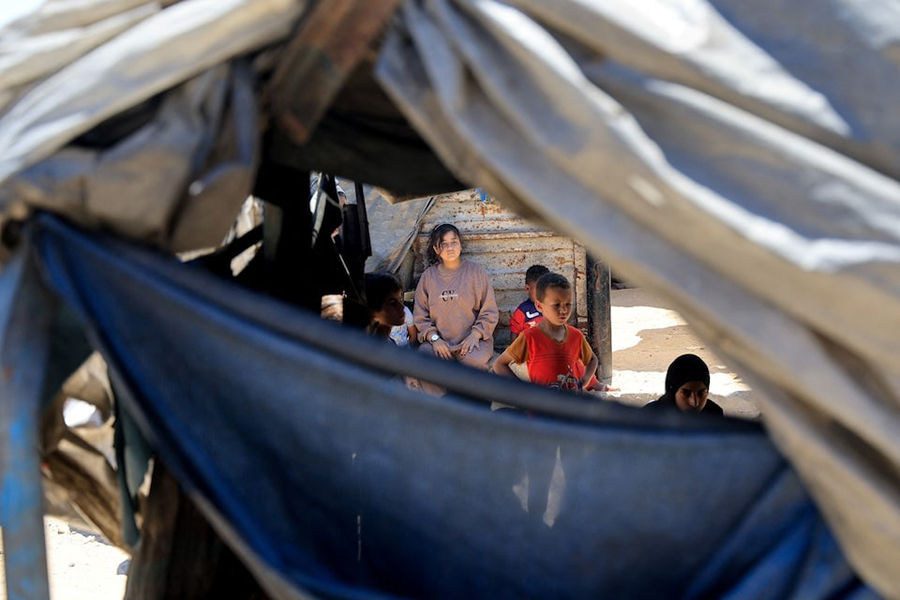 Palestinians, displaced by the Israeli military offensive, take shelter in tents, in Khan Younis, in the southern Gaza Strip on May 29, 2025 — Reuters photo