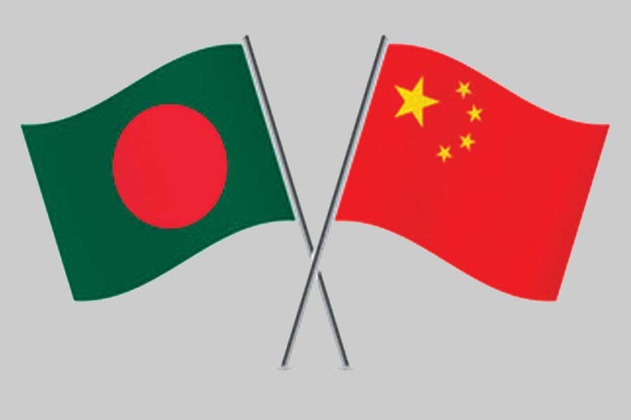 Flags of Bangladesh and China are seen cross-pinned, symbolising friendship between the two nations — Collected