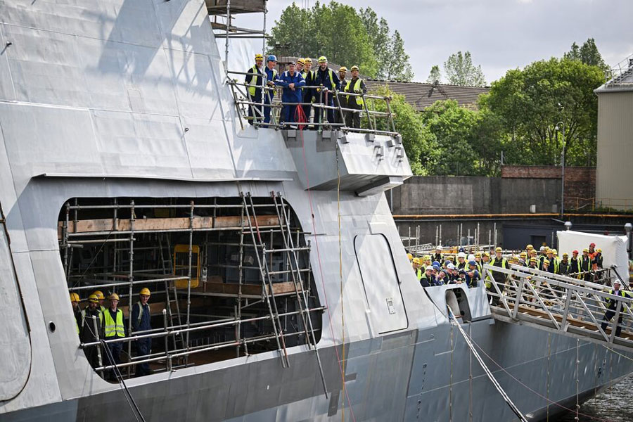 Members of staff react during a visit by Britain’s Prime Minister Keir Starmer to the BAE Systems’ Govan facility, in Glasgow, Scotland, Britain, June 2, 2025.