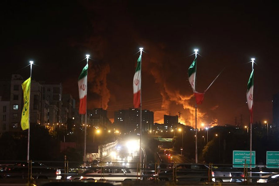 Fire of Israeli attack on Sharan Oil depot is seen following the Israeli strikes on Iran, in Tehran, Iran, June 15, 2025.