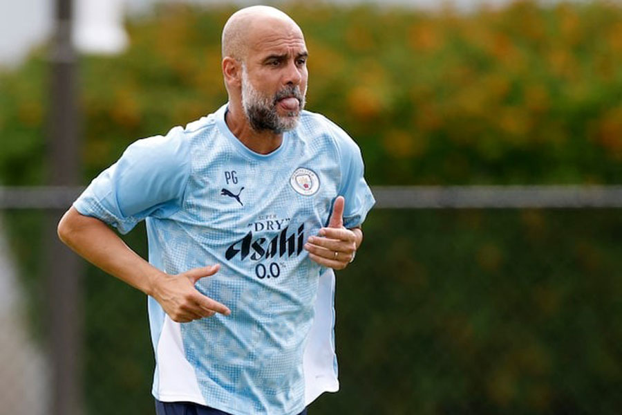 Soccer Football - FIFA Club World Cup - Manchester City Training - Lynn University, Boca Raton, Florida, US - June 21, 2025 Manchester City manager Pep Guardiola during training REUTERS/Marco Bello/Files