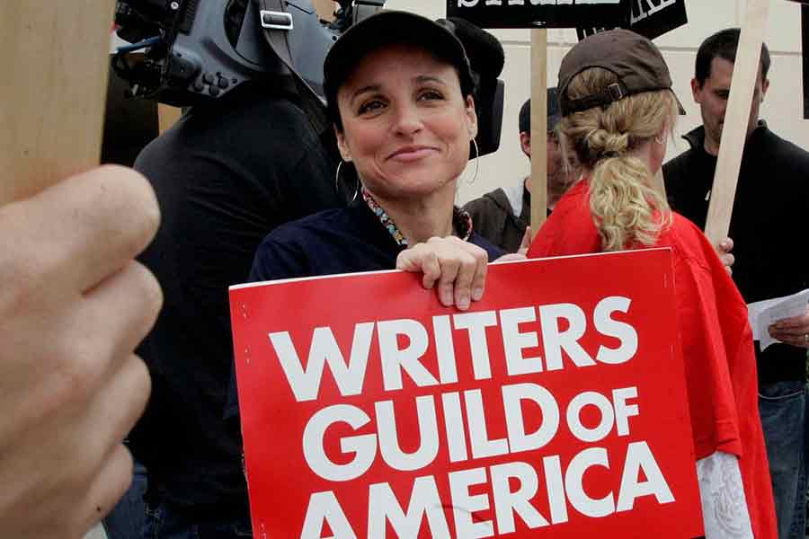 Actress Julia Louis-Dreyfus (C), star of the Warner Bros. Television series 'The New Adventures of the Old Christine', and a member of the Screen Actors Guild carrying a picket sign at Warner Bros. Studios in Burbank in California November 5 in 2007 –Reuters file photo