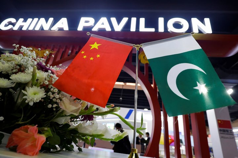 Flags of Pakistan and China are seen at the entrance of the China Pavilion, during the International Defence Exhibition and Seminar "IDEAS 2022" in Karachi, Pakistan November 16, 2022.