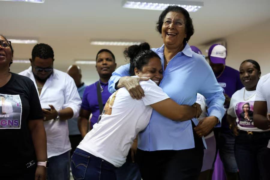 Suriname's opposition leader Jennifer Geerlings-Simons of the National Democratic Party (NDP) celebrates with supporters as she proclaims herself the winner of the presidency as counting continues during the National Assembly election, in Paramaribo, Suriname, May 26, 2025.