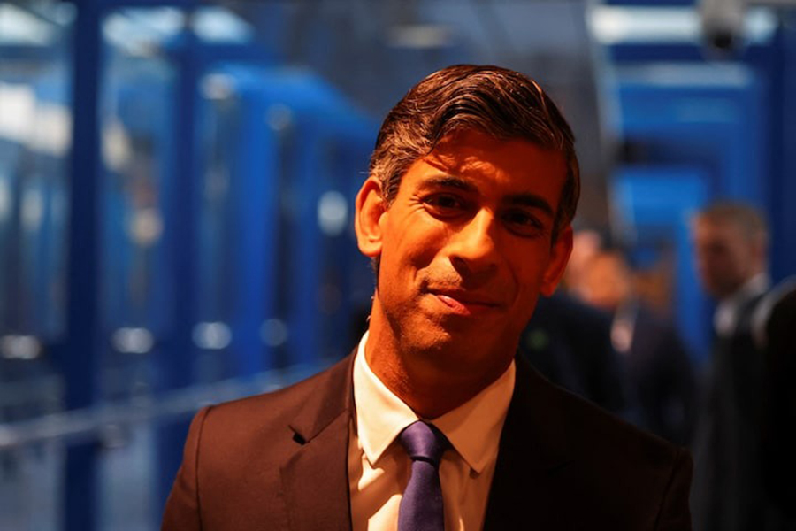 Former British Prime Minister and current Conservative Party leader Rishi Sunak looks on as he walks between venues during the Britain's Conservative Party's annual conference in Birmingham, Britain on September 29, 2024 — Reuters/File