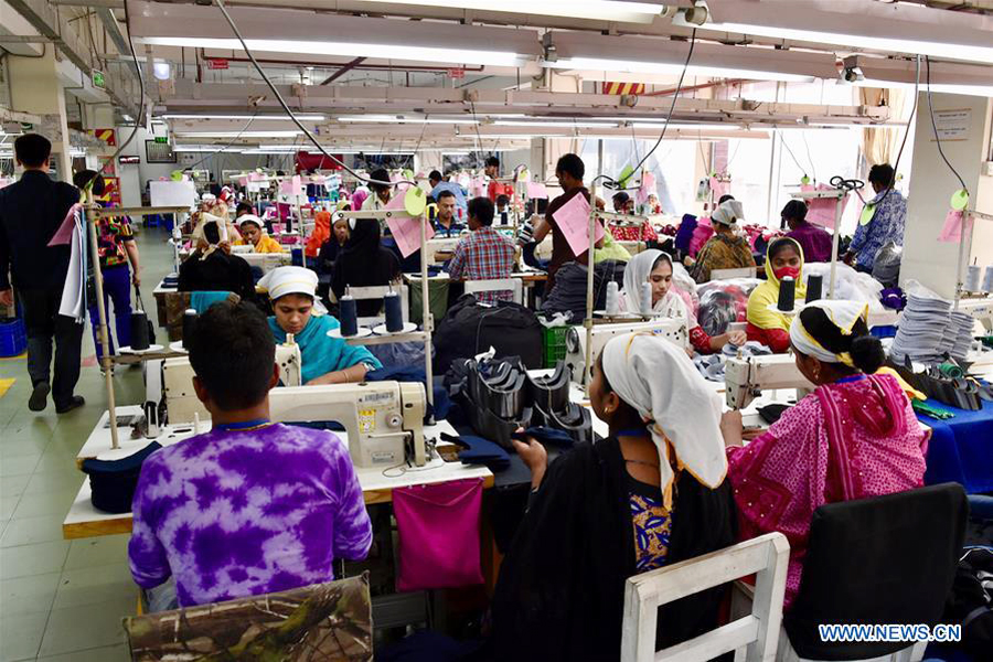 Workers are busy on the production lines at a textile factory in Bangladesh - Xinhua Photo