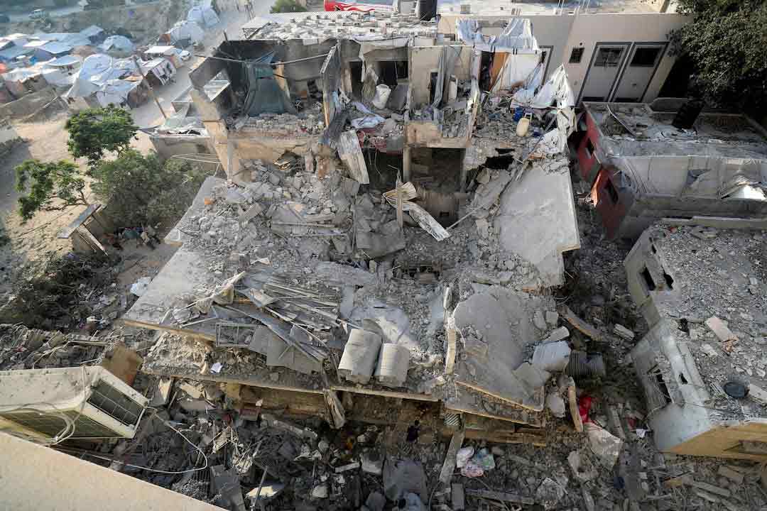 Debris lies at the site of an overnight Israeli air strike on a house, in Gaza City, July 23, 2025.