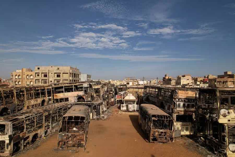 Burnt-out buses are seen following violent protests in Keur Massar neighborhood in Senegal on Wednesday -Reuters photo