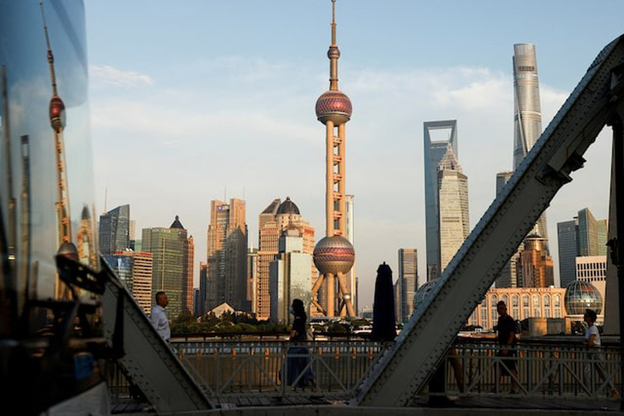 A view of the financial district of Pudong is reflected on a bus passing by, in Shanghai, China September 27, 2024.