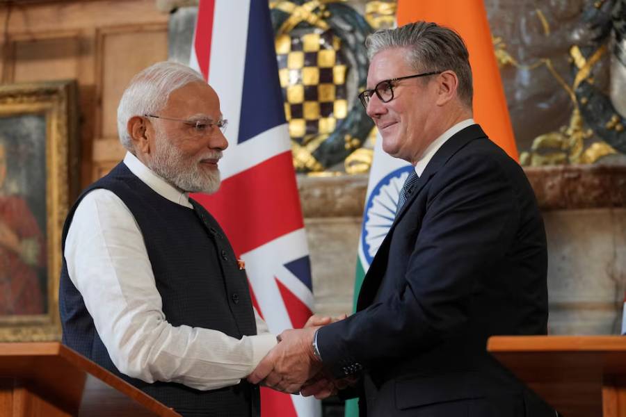 Britain's Prime Minister Keir Starmer and Prime Minister Narendra Modi of India shake hands after signing a free trade agreement at Chequers near Aylesbury, England, Thursday, July 24, 2025.