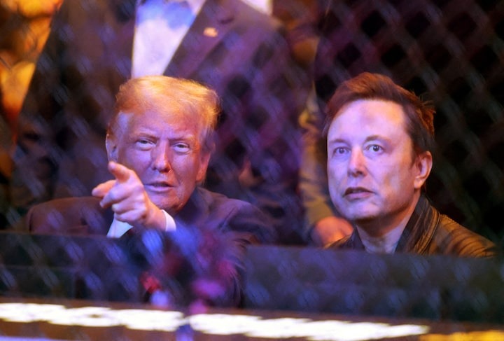 Nov 16, 2024; New York, NY, USA; President-elect Donald Trump talks with Elon Musk (right) during UFC 309 at Madison Square Garden.