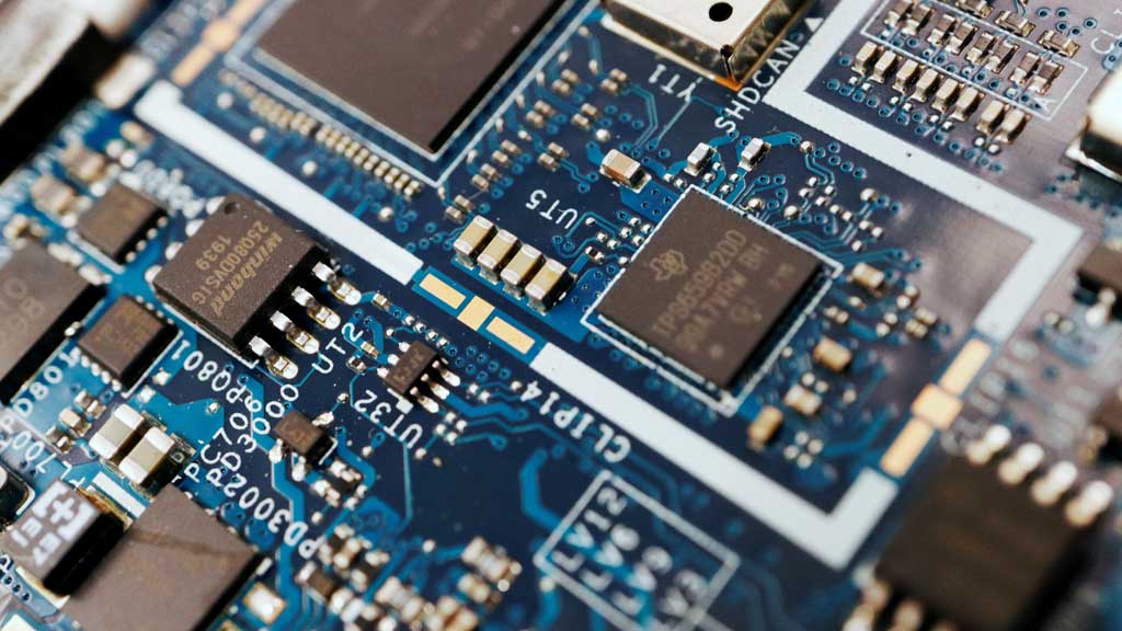 Semiconductor chips are seen on a circuit board of a computer in this illustration picture taken February 25, 2022. REUTERS