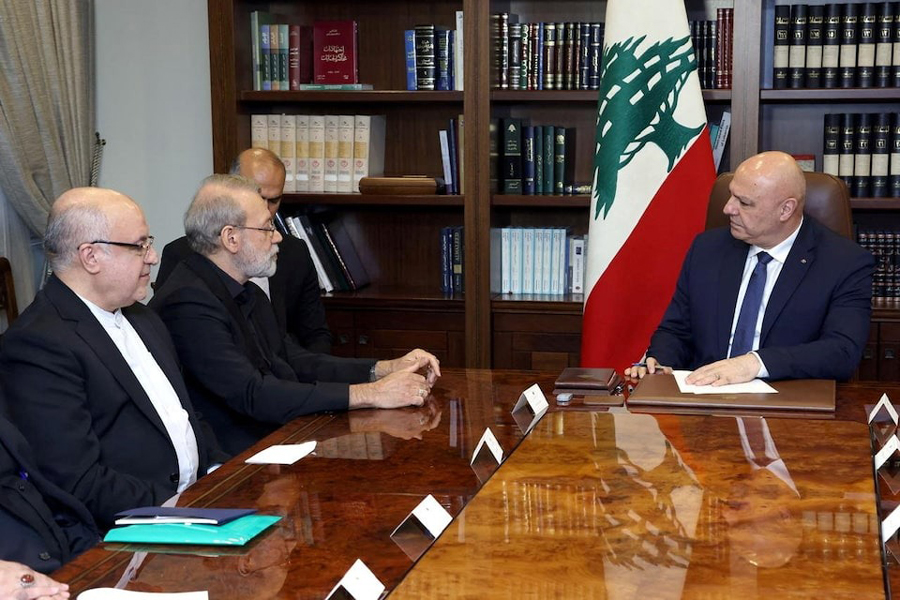 Iran's Supreme National Security Council Secretary Ali Larijani meets with Lebanese President Joseph Aoun at the presidential palace in Baabda, Lebanon, in this handout image released on August 13, 2025.