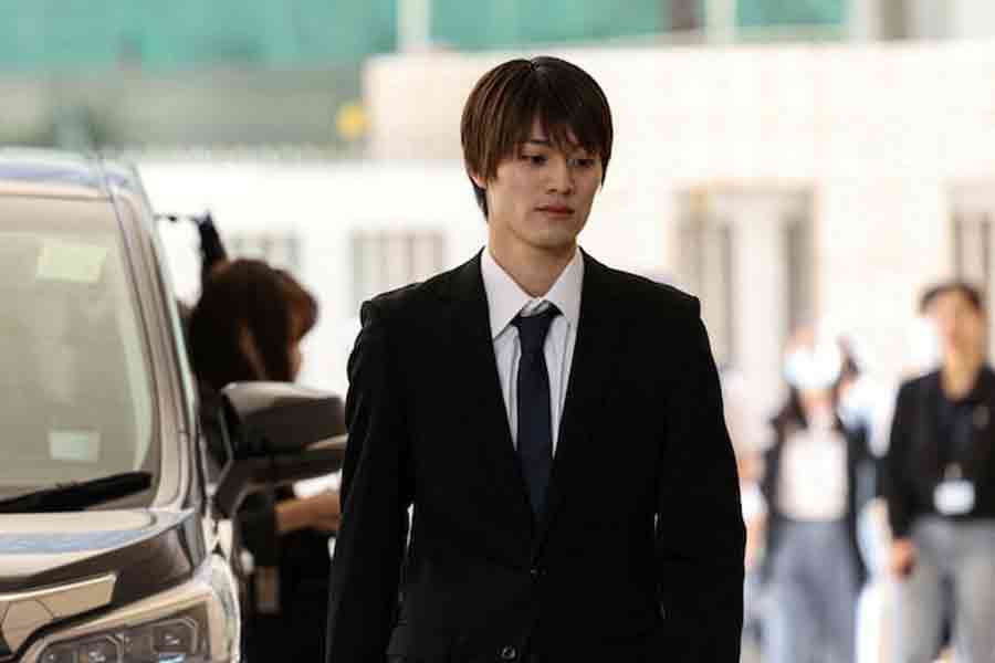 Kenshin Kamimura, a former member of the Japanese boy band ONE N' ONLY, arrives at West Kowloon Magistrates' Courts over his charge of indecent assault in Hong Kong, China, Apr 15, 2025.