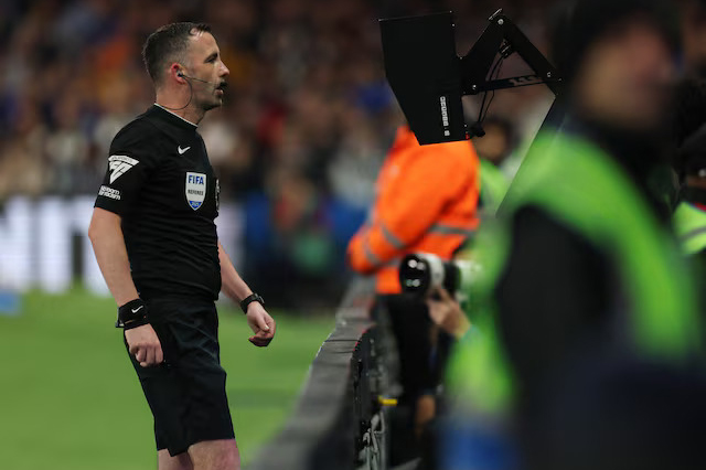 Referee Chris Kavanagh looks at a VAR screen during the Premier League match between Chelsea and Manchester United at Stamford Bridge in London, Britain on May 16, 2025 — Reuters/File