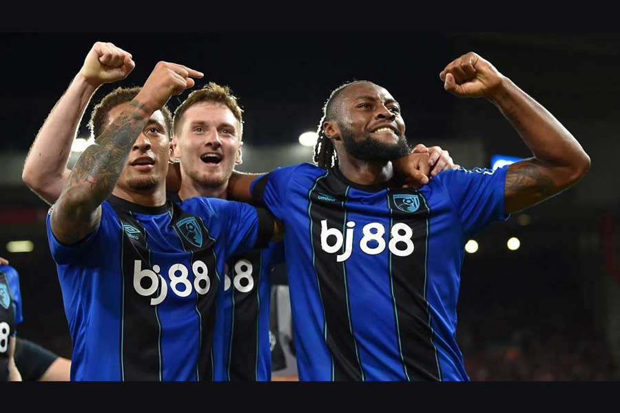 AFC Bournemouth's Antoine Semenyo celebrates scoring their second goal with Marcus Tavernier - Premier League - Liverpool v AFC Bournemouth - Anfield, Liverpool, Britain - Aug 15, 2025.