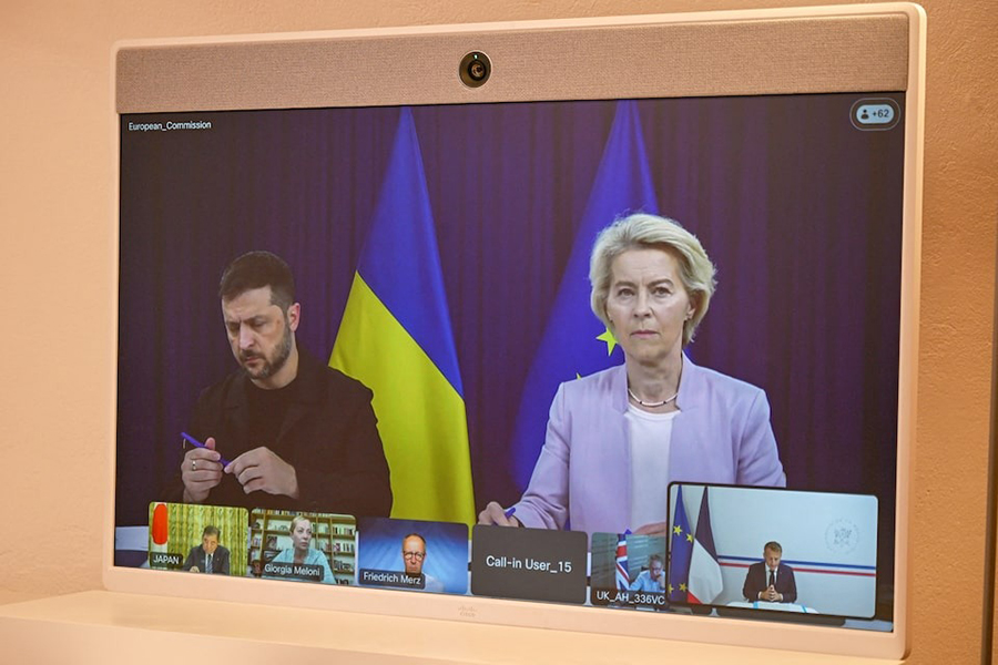European Commission Ursula von der Leyen and Ukrainian President Volodymyr Zelenskiy appear on a screen during a video conference with French President Emmanuel Macron as part of the so-called “coalition of the willing”, Sunday, August 17, 2025 at the Fort de Bregancon in Bormes-les-Mimosas, France — Pool via Reuters
