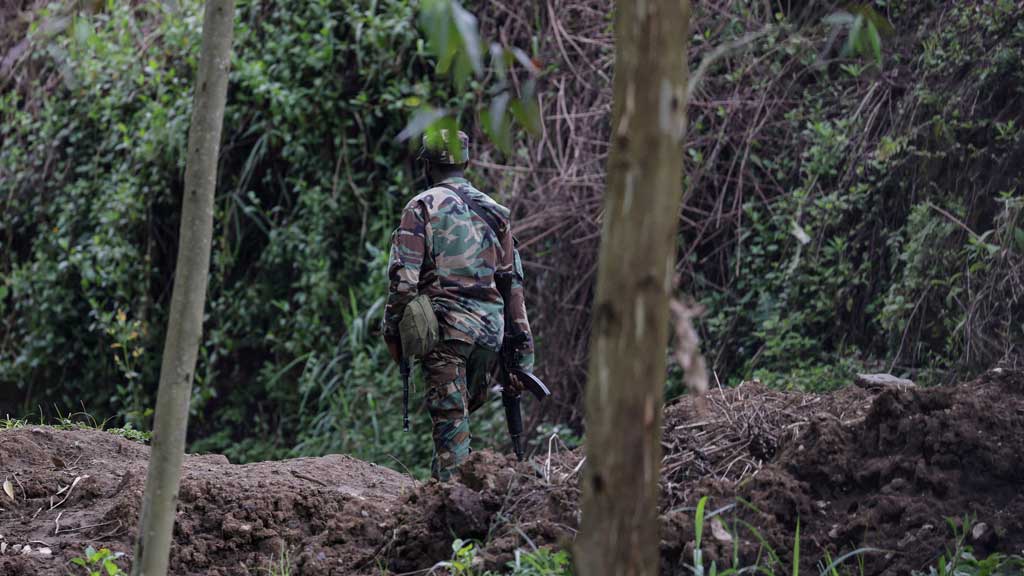An M23 rebel walks on the outskirts of Matanda which is controlled by M23 rebels, in eastern Democratic Republic of Congo, March 22, 2025. REUTERS/Zohra Bensemra
