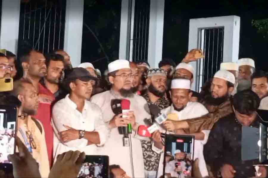 Teachers hold nighttime protest at Shaheed Minar over allowance demands