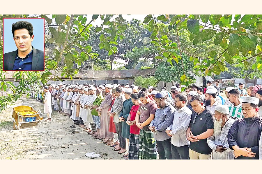 The namaz-e-janaza of Abul Kalam Azad (inset) in progress in his ancestral home in Naria under Shariatpur on Monday. Azad died on the spot after a bearing pad of the Dhaka Metro Rail fell on him near the Farmgate area of the capital on Sunday. — Focus Bangla