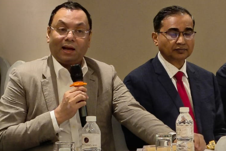BTMA President Showkat Aziz Russell (left) speaks at a roundtable organised by The Financial Express in Dhaka on Monday