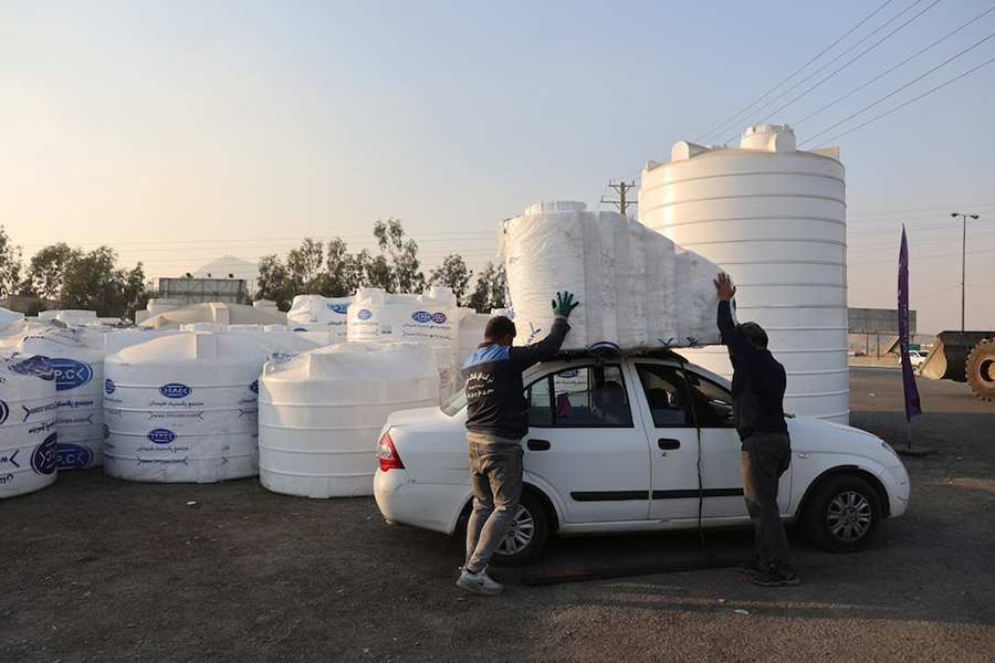 People shop water storage tanks following a drought crisis in Tehran, Iran, November 10, 2025 — WANA (West Asia News Agency) via REUTERS