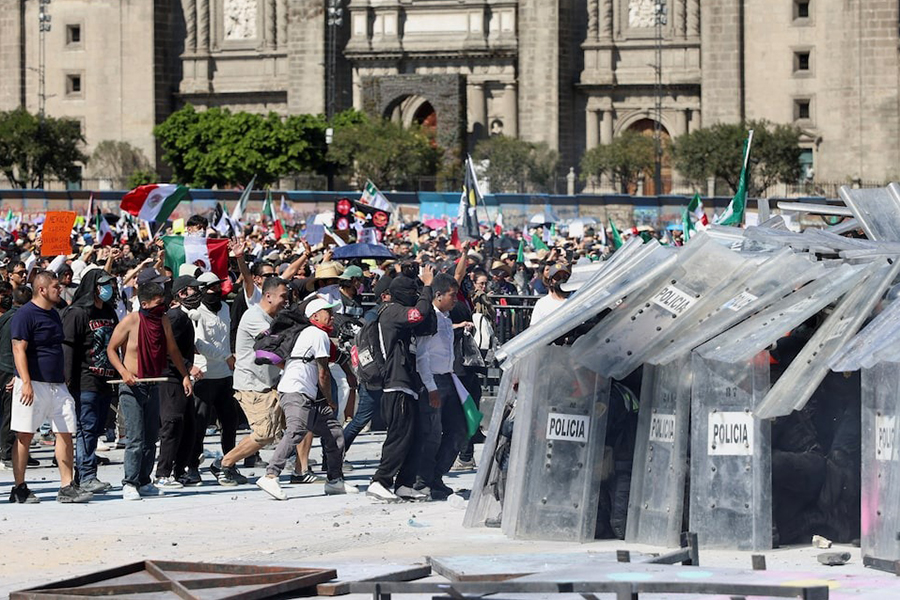 Demonstrators clash with police officers during a protest against insecurity and corruption in the country, outside the National Palace, in Mexico City, Mexico on November 15, 2025 — Reuters photo