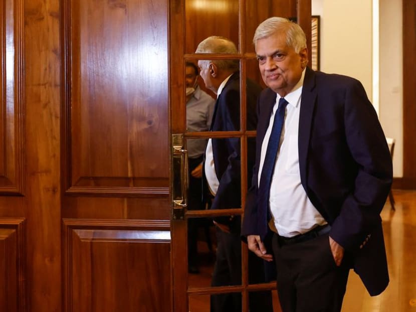 FILE PHOTO: Sri Lanka's President Ranil Wickremesinghe arrives for an interview with Reuters at Presidential Secretariat, amid the country's economic crisis, in Colombo, Sri Lanka August 18, 2022. REUTERS/ Dinuka Liyanawatte