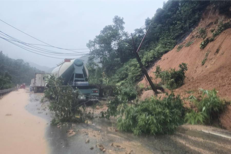Landslides block the road on Khanh Le pass, near the location where a passenger bus was buried by a landslide in Khanh Hoa, Vietnam, Monday, Nov. 17, 2025.