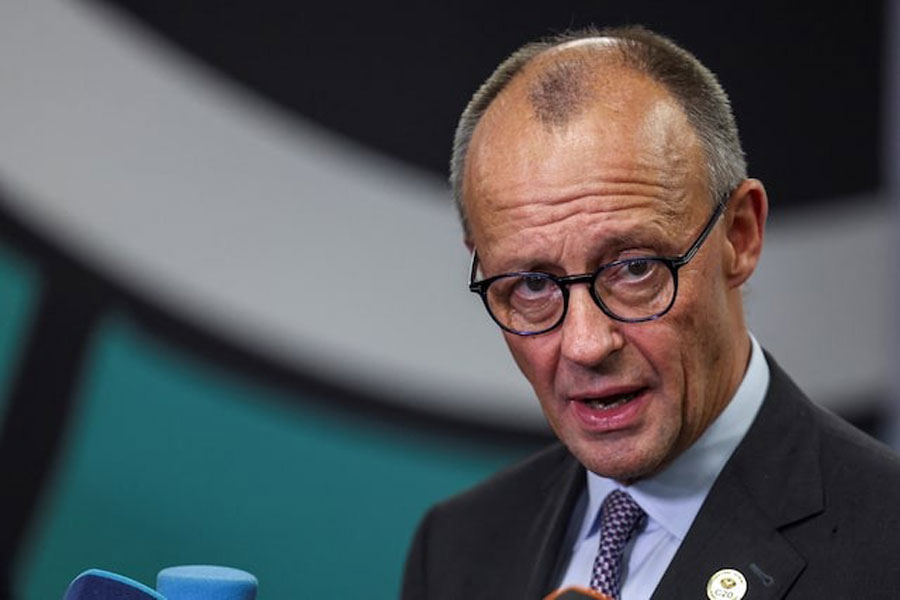 Germany's Chancellor Friedrich Merz speaks to the media, on the opening day of the G20 Leaders’ Summit at the Nasrec Expo Center in Johannesburg, South Africa, November 22, 2025.