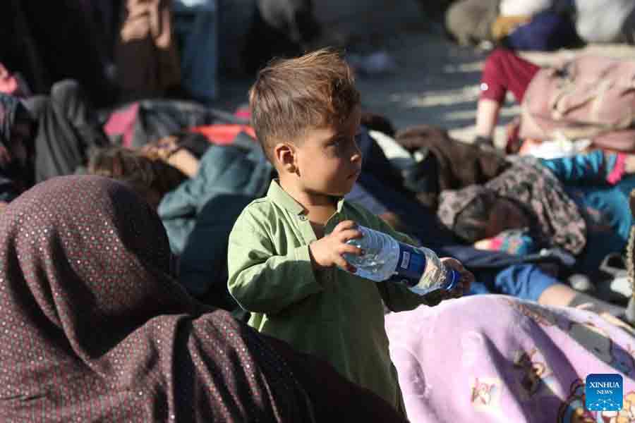 An Afghan child is seen at a makeshift camp in Kabul, Afghanistan, Nov. 23, 2025.