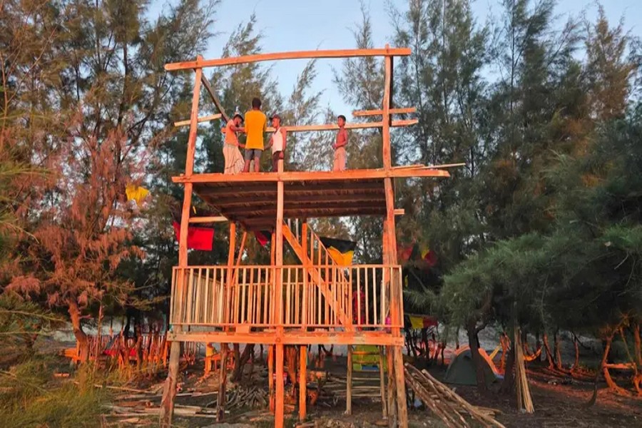 The photo shows labourers engaged in construction work of a resort on Sonadia Island in Maheshkhali upazila of Cox's Bazar district- FE Photo