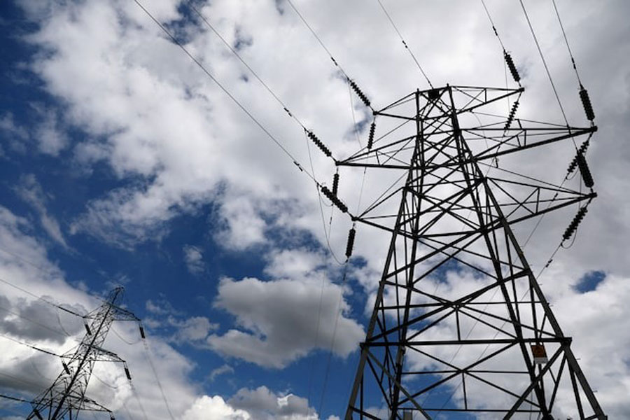 Electricity pylons are seen in London, Britain August 1, 2017.