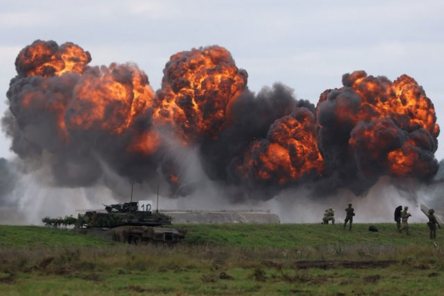 Smoke billows from a blast near Polish Abrams tank as Polish forces with NATO soldiers hold military exercises 'Iron Defender' at a military range in Wierzbiny near Orzysz, Poland, September17, 2025.