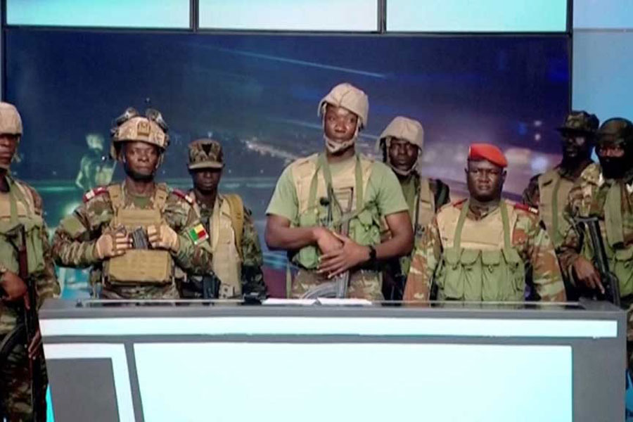 A group of soldiers gives a statement on Benin's national television, claiming to have seized power, following reports of a coup attempt underway against the government of Benin's President Patrice Talon, in Cotonou, Benin, in this screengrab from a handout video obtained by Reuters on Dec 7, 2025. Benin TV/Handout via REUTERS