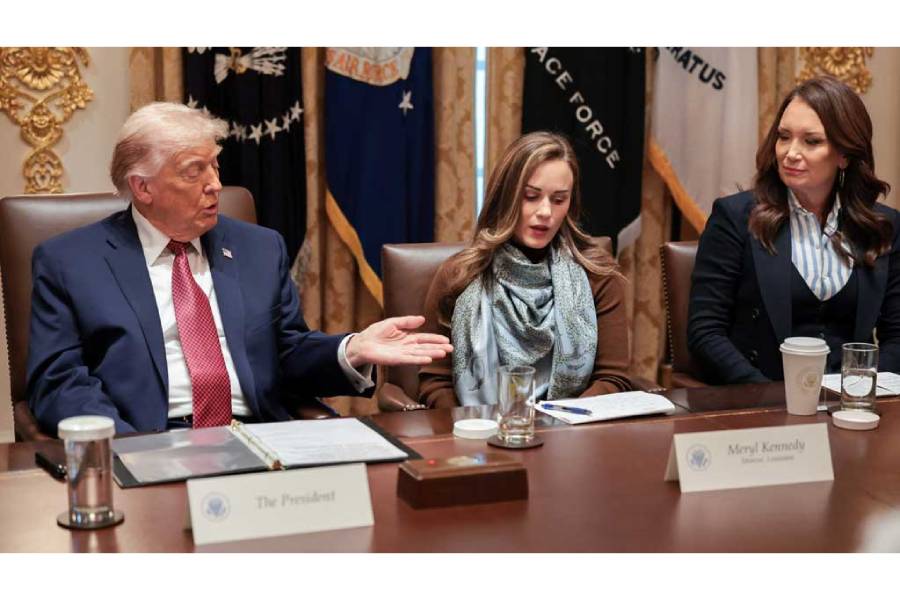 US President Donald Trump speaks next to Meryl Kennedy of the rice farming company 4 Sisters and US Agriculture Secretary Brooke Rollins during a roundtable discussion at the White House in Washington, DC, US, Dec 8, 2025.