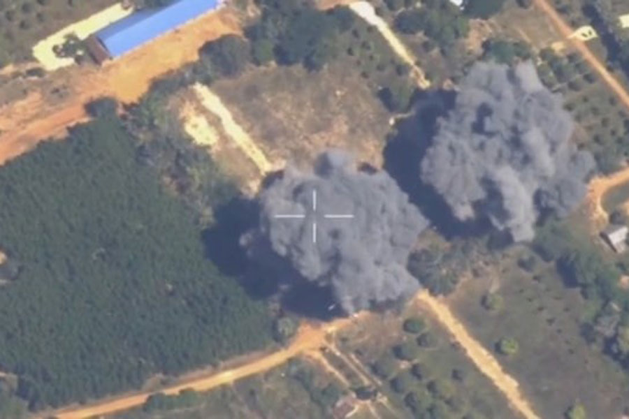 Footage shows smoke rising following what Thailand said was airstrikes carried out in Cambodia along a disputed border area, in Preah Netr Preah, Banteay Meanchey Province, Cambodia, in this screen grab taken from a handout video released on December 15, 2025.