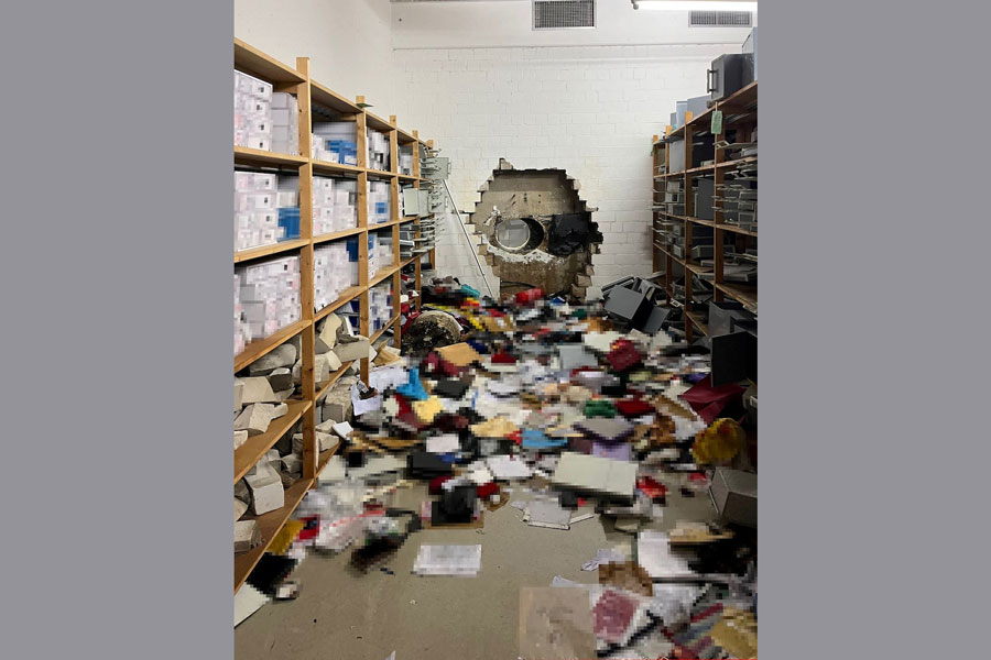 A hole gapes in a wall after thieves drilled into the vault of a Sparkasse savings bank in Gelsenkirchen, Germany, December 29, 2025, in this image released December 30, 2025, by the police.