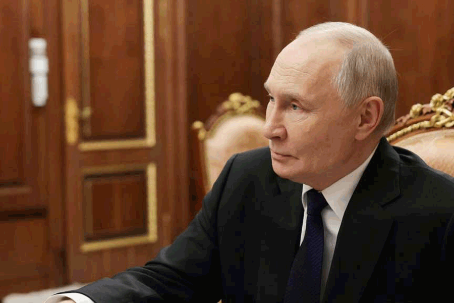 Russia's President Vladimir Putin attends a meeting with Deputy Minister of Defence and Chair of Defenders of the Fatherland Foundation Anna Tsivileva in Moscow, Russia, Dec 30, 2025.