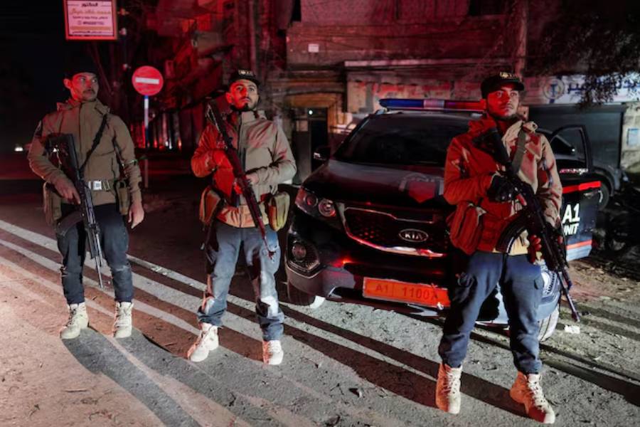 Security forces affiliated with the Ministry of the Interior stand guard in the Ashrafieh neighbourhood, which they have taken control of, according to the Ministry of the Interior, following battles with the Syrian Democratic Forces, in Aleppo, Syria, January 9, 2026.