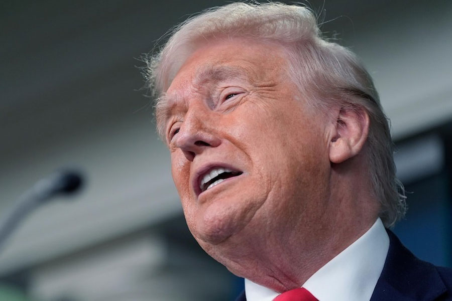 President Donald Trump speaks in the James Brady Press Briefing Room at the White House, Tuesday, Jan. 20, 2026, in Washington.