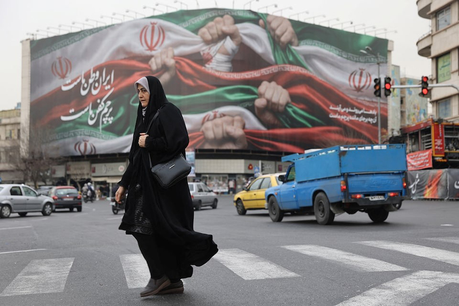 An Iranian woman walks on a street in Tehran, Iran on January 19, 2026 — WANA (West Asia News Agency) via REUTERS