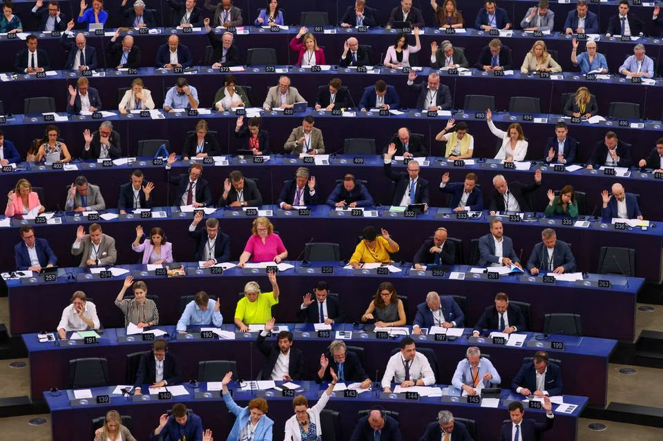 Members of the EU Parliament vote during a plenary session at the European Parliament in Starsbourg, France on June 13, 2023 — Reuters photo