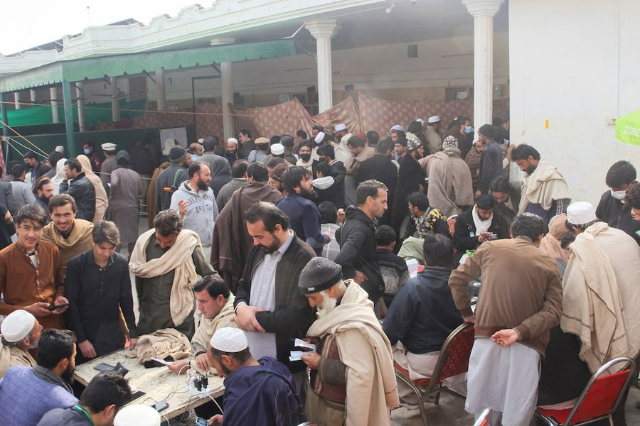 Residents from Tirah valley, who fled a remote mountainous region bordering Afghanistan, gather to get themself registered, in Bara, Khyber District of Khyber Pakhtunkhwa province, Pakistan, January 30, 2026.