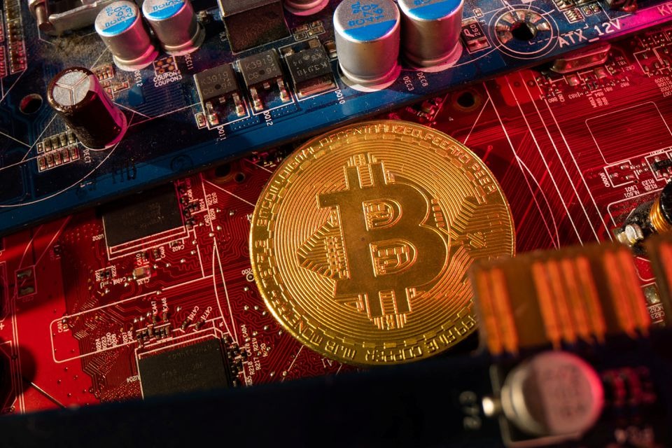 A representation of cryptocurrency Bitcoin is placed on a PC motherboard, in this illustration taken on June 16, 2023 — Reuters illustration/Files