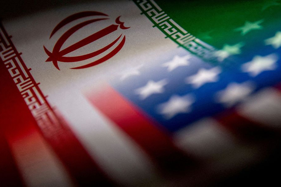 The Iranian and US flags are seen printed on paper in this illustration taken on January 27, 2022 — Reuters illustration/Files