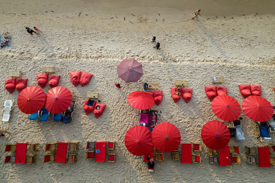 Umbrellas are seen in a restaurant as tourists enjoy a beach in the island of Phuket in Thailand January 19, 2023. REUTERS/Jorge Silva/file photo