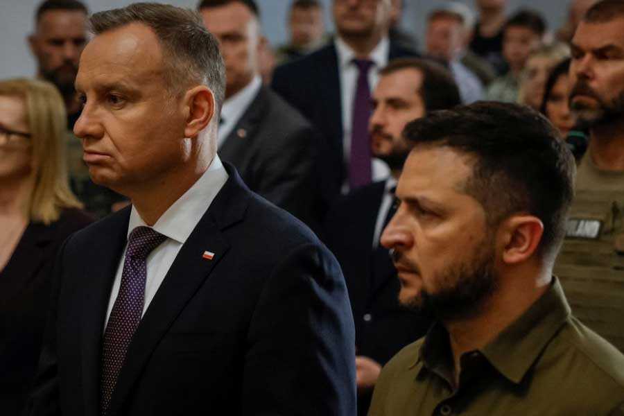 Ukraine's President Volodymyr Zelensky and Polish President Andrzej Duda commemorating victims of World War II at the Saint Peter and Paul Cathedral in Lutsk of Ukraine on July 9 this year –Reuters file photo