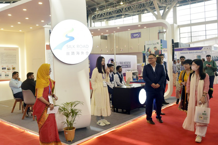 People visit a booth during The Belt and Road Initiative in Bangladesh Exhibition 2023 in Dhaka, Bangladesh, on September 8, 2023—Xinhua Photo